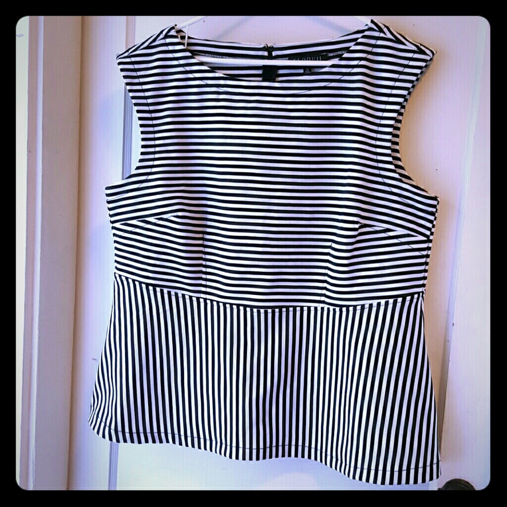 Black and white striped peplum top.